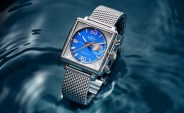 blue square shinola watch hovers above a pool of water