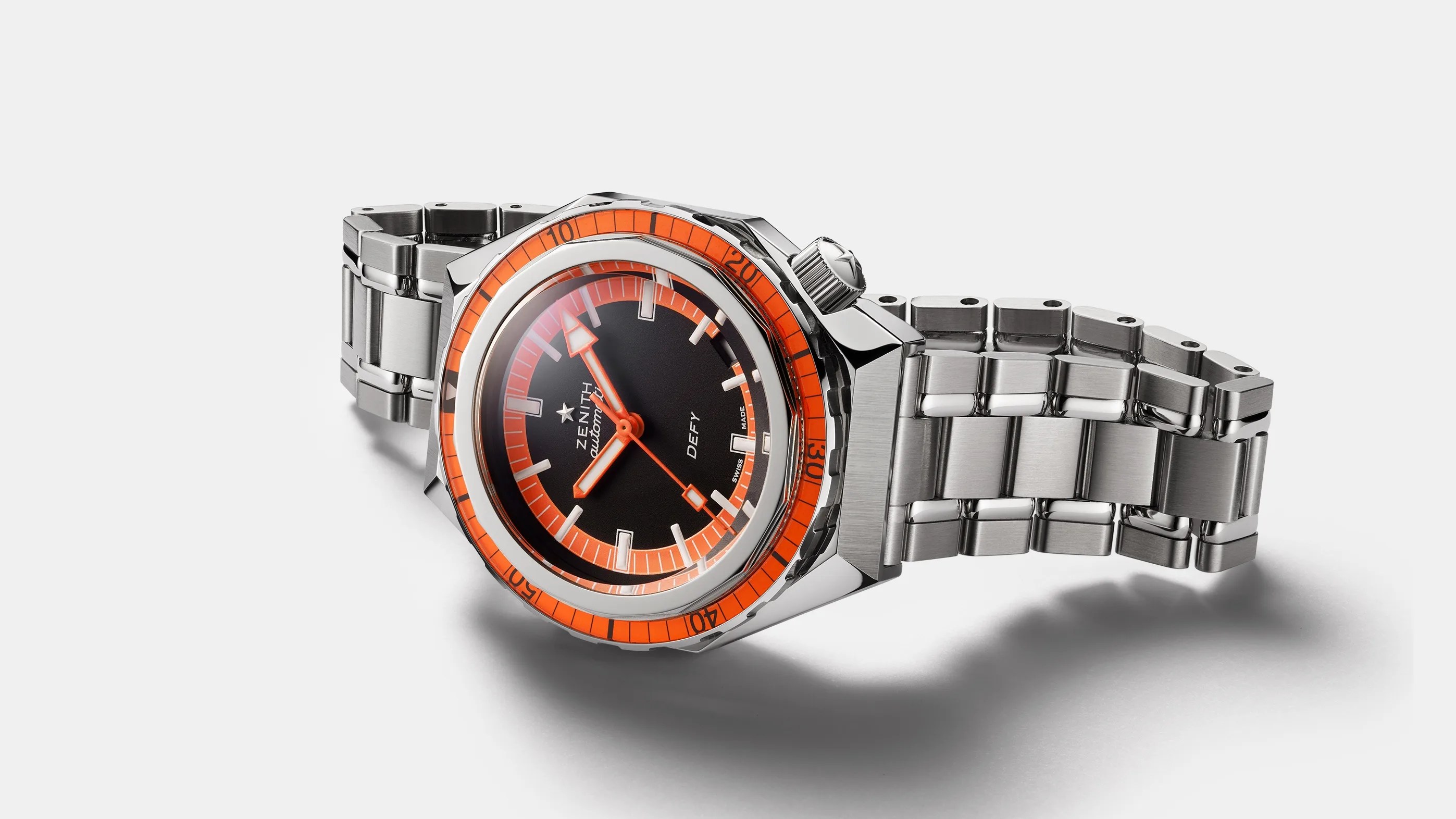zenith orange dive watch on its side