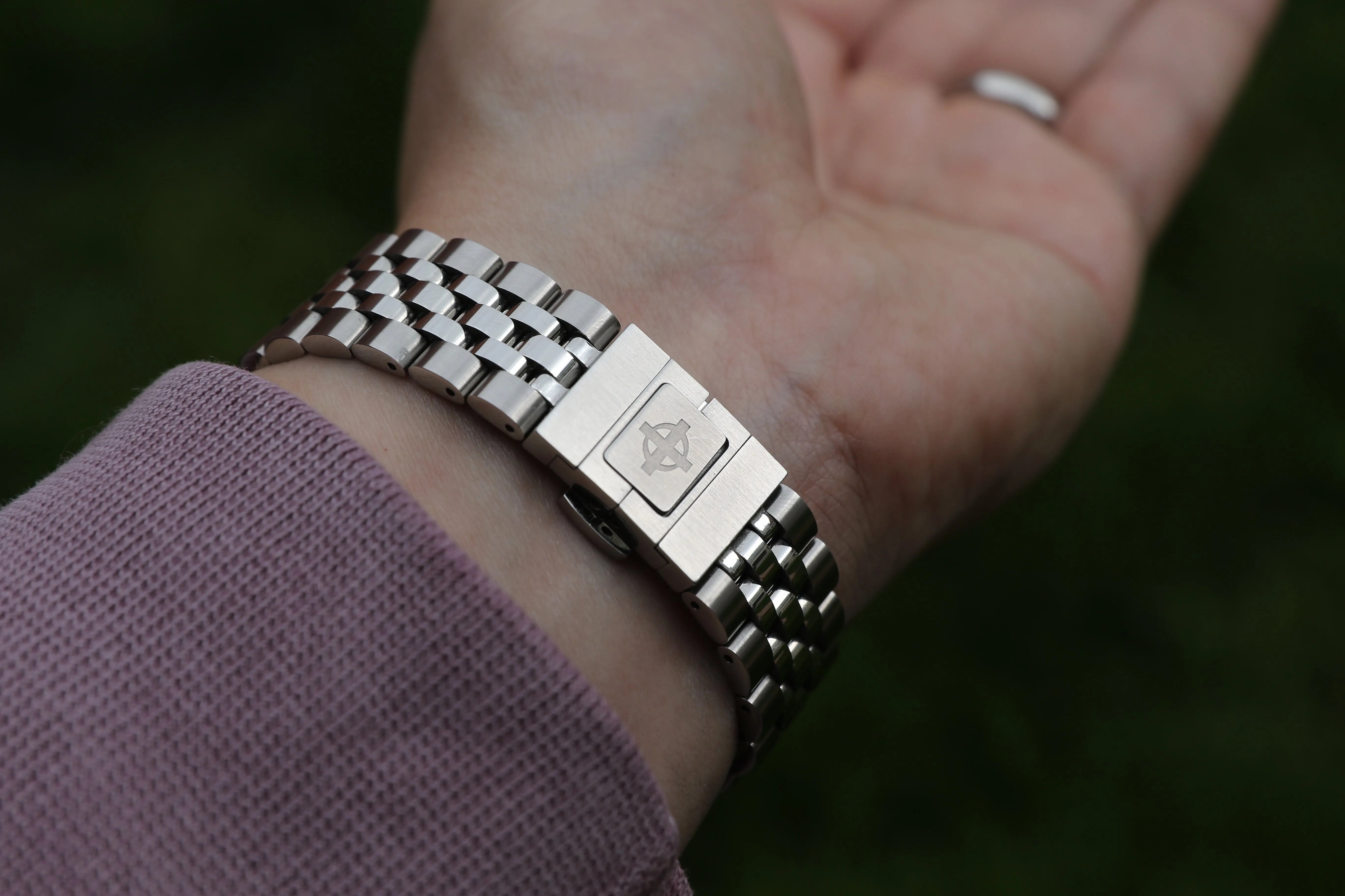 zodiac watch clasp on wrist