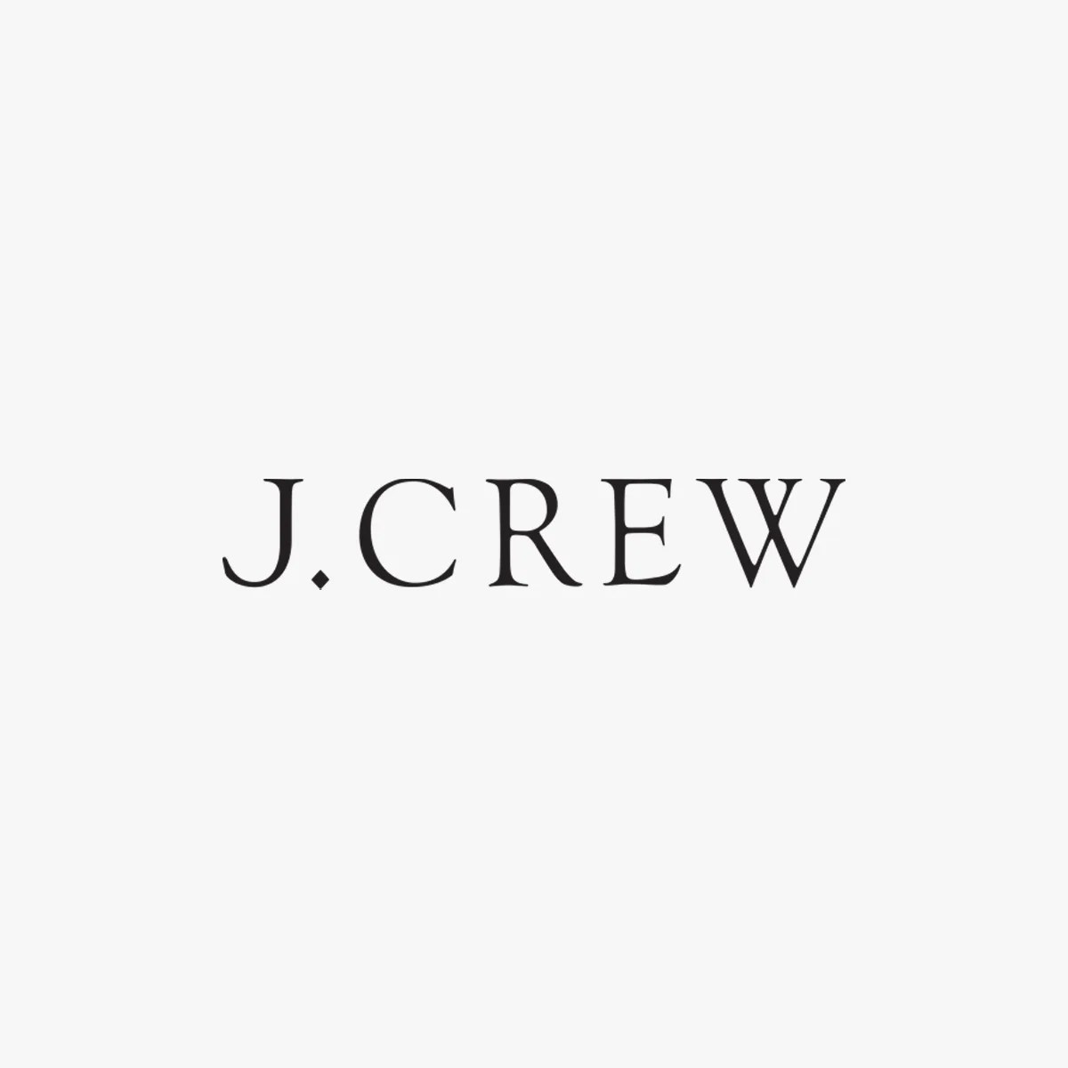 J. Crew brand logo on grey background