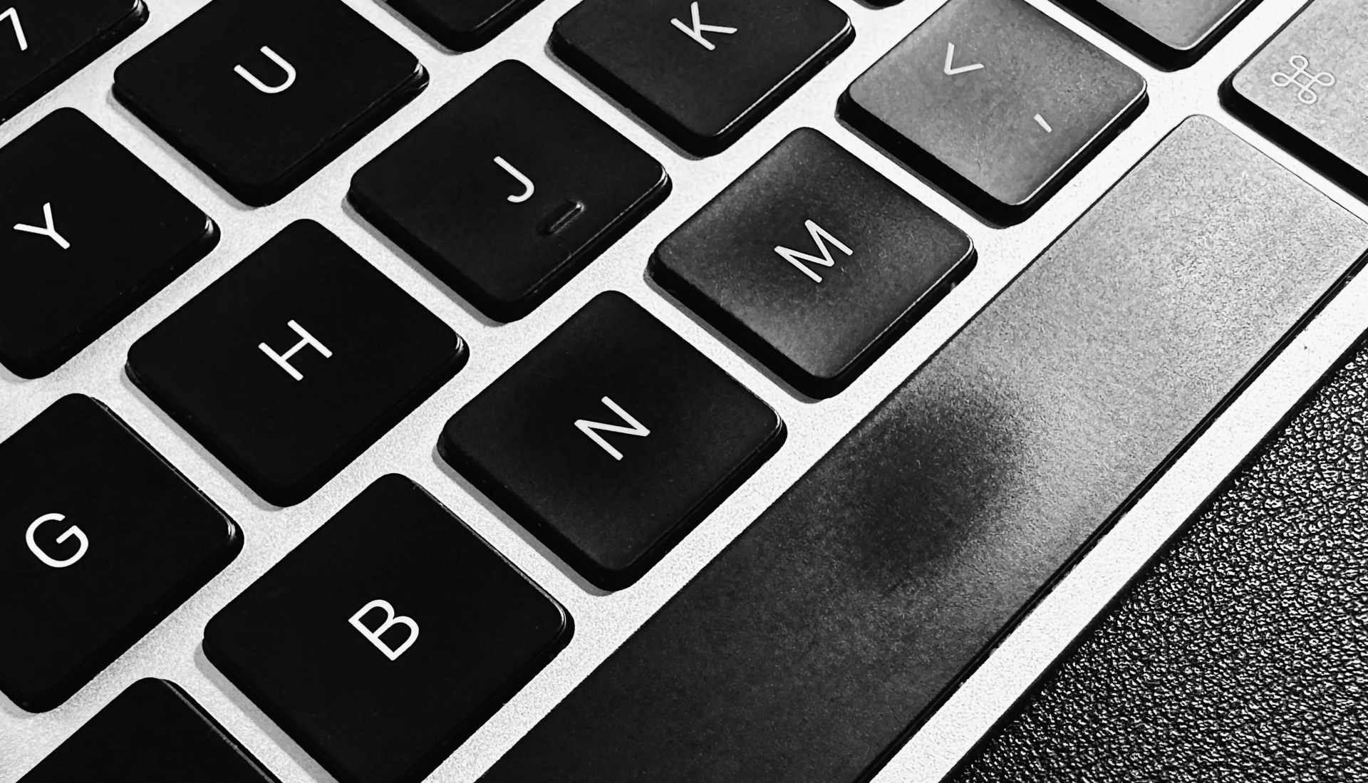 Close up of Apple Magic Keyboard showing shiny mark on spacebar key