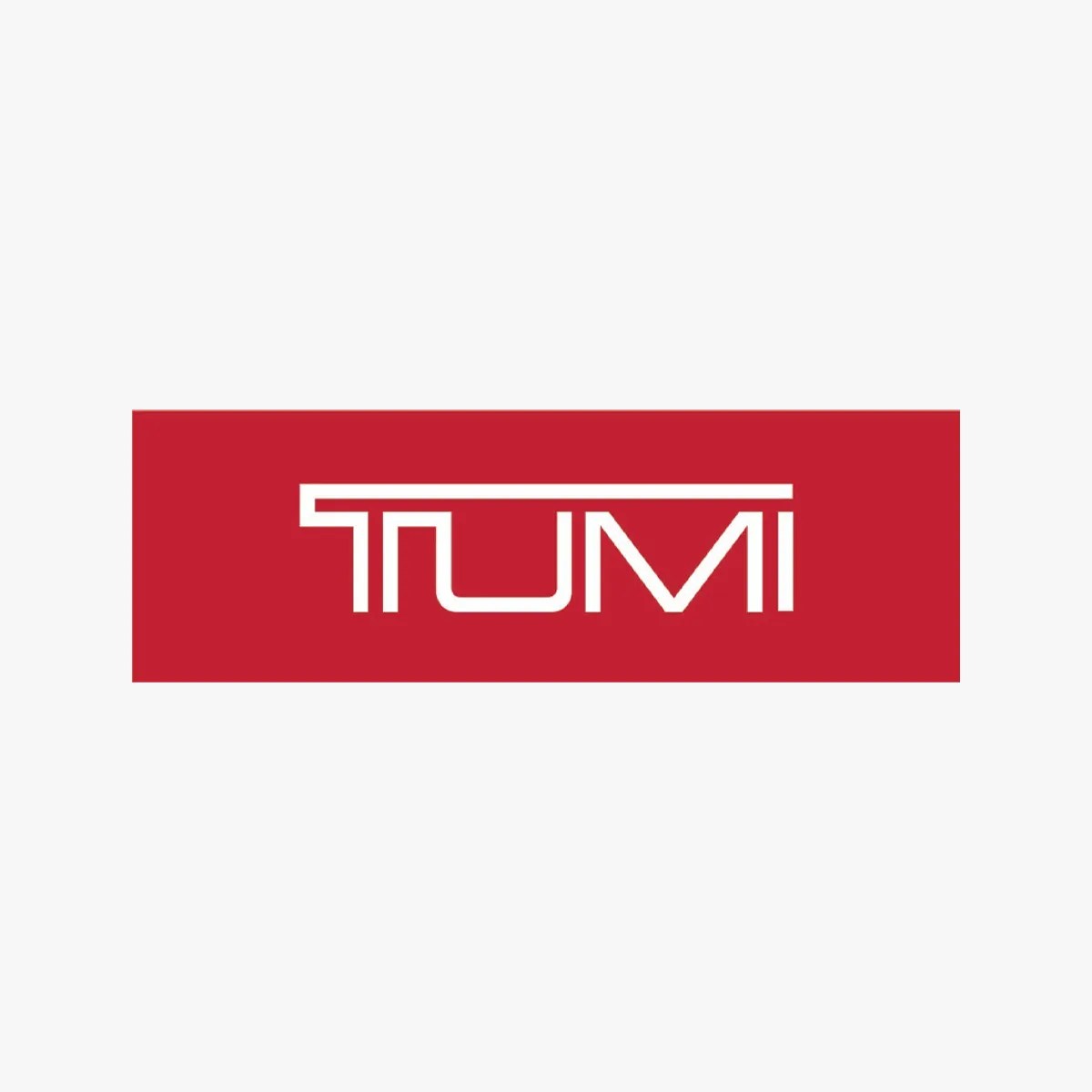 Tumi brand logo on grey background