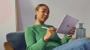woman using a purple ipad air