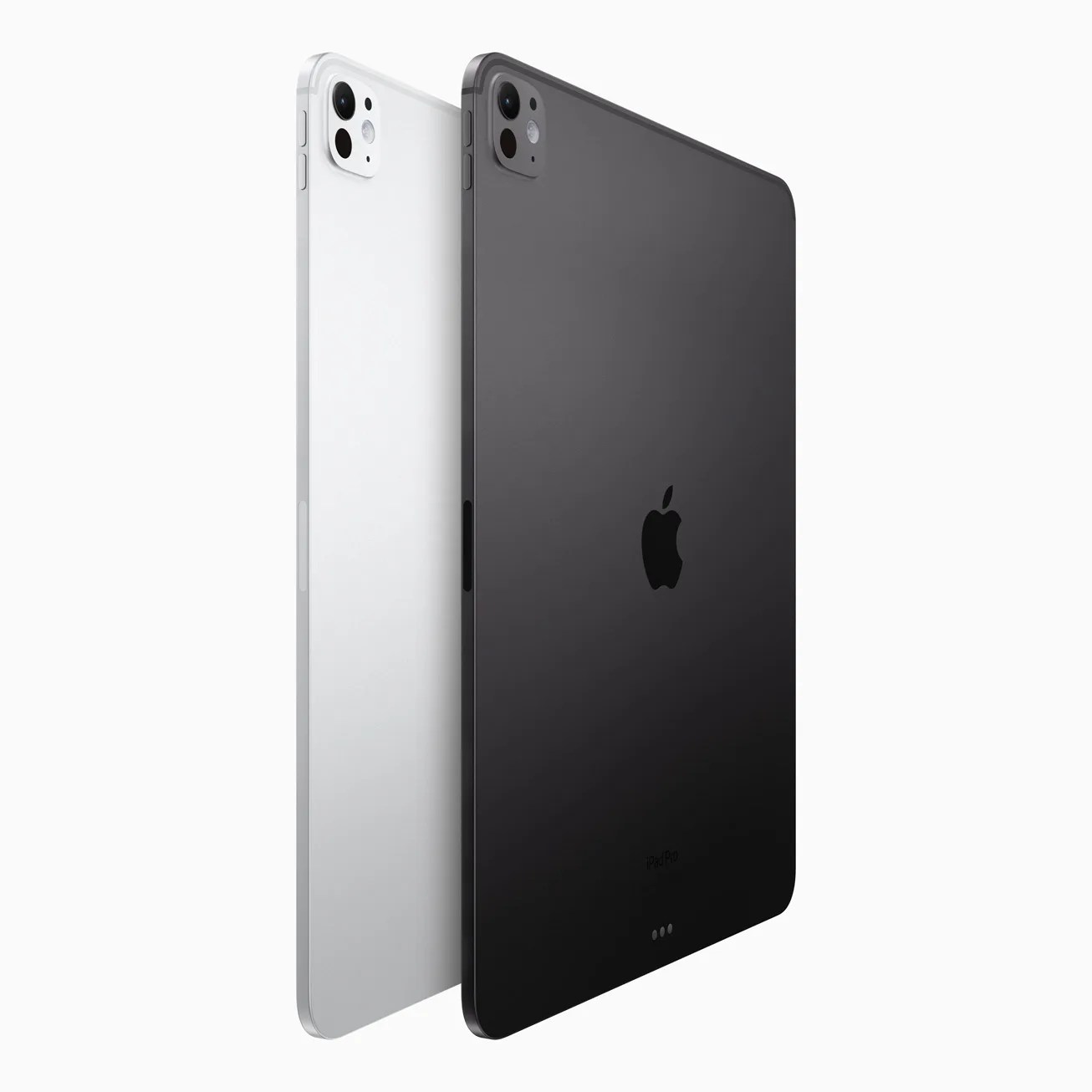 a silver and a black ipad pro