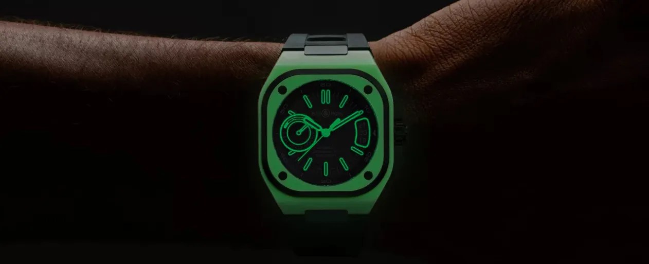 bell and ross watch glows on a mans wrist