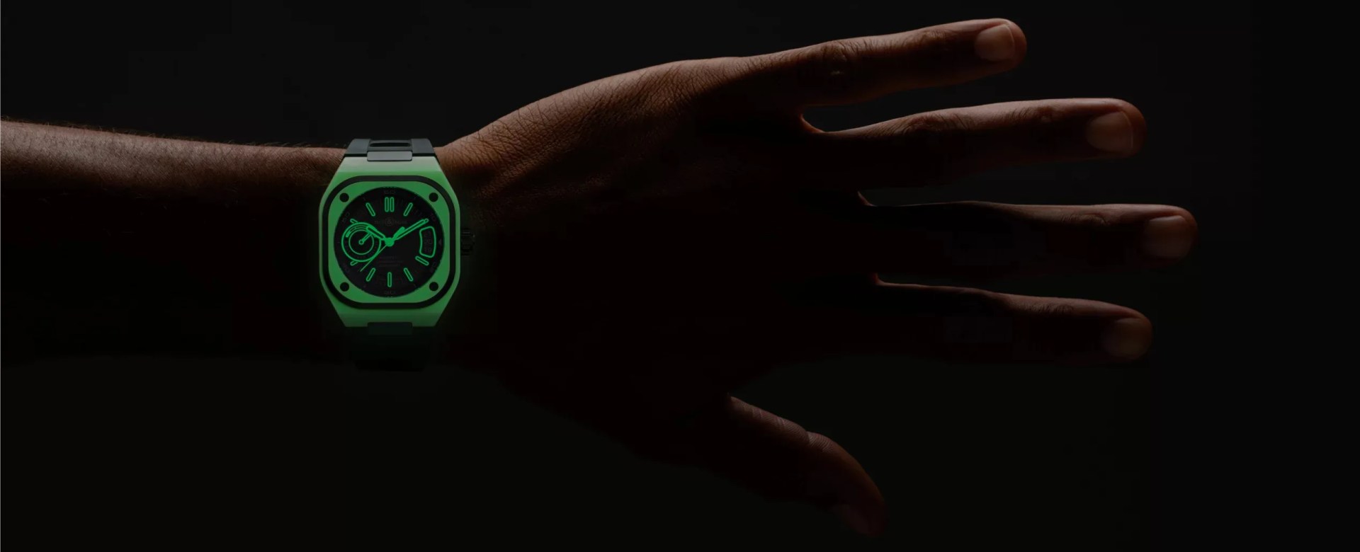bell and ross watch glows on a mans wrist