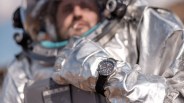 fortis watch on the wrist of an astronaut