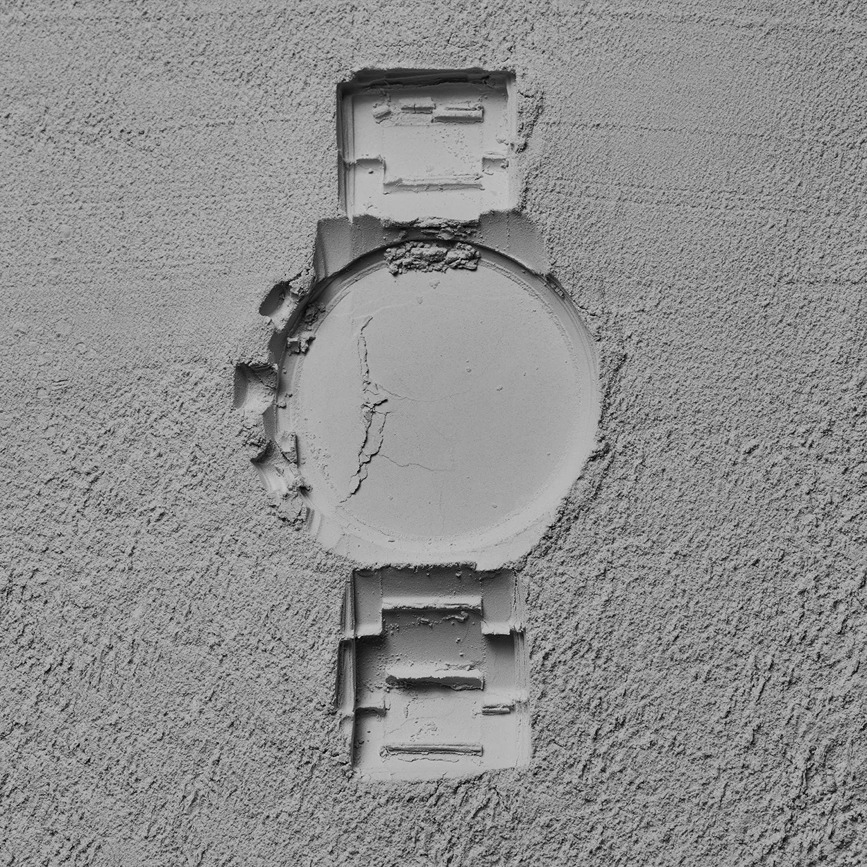 watch imprint in sand