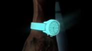 glowing iwc watch on a mans wrist