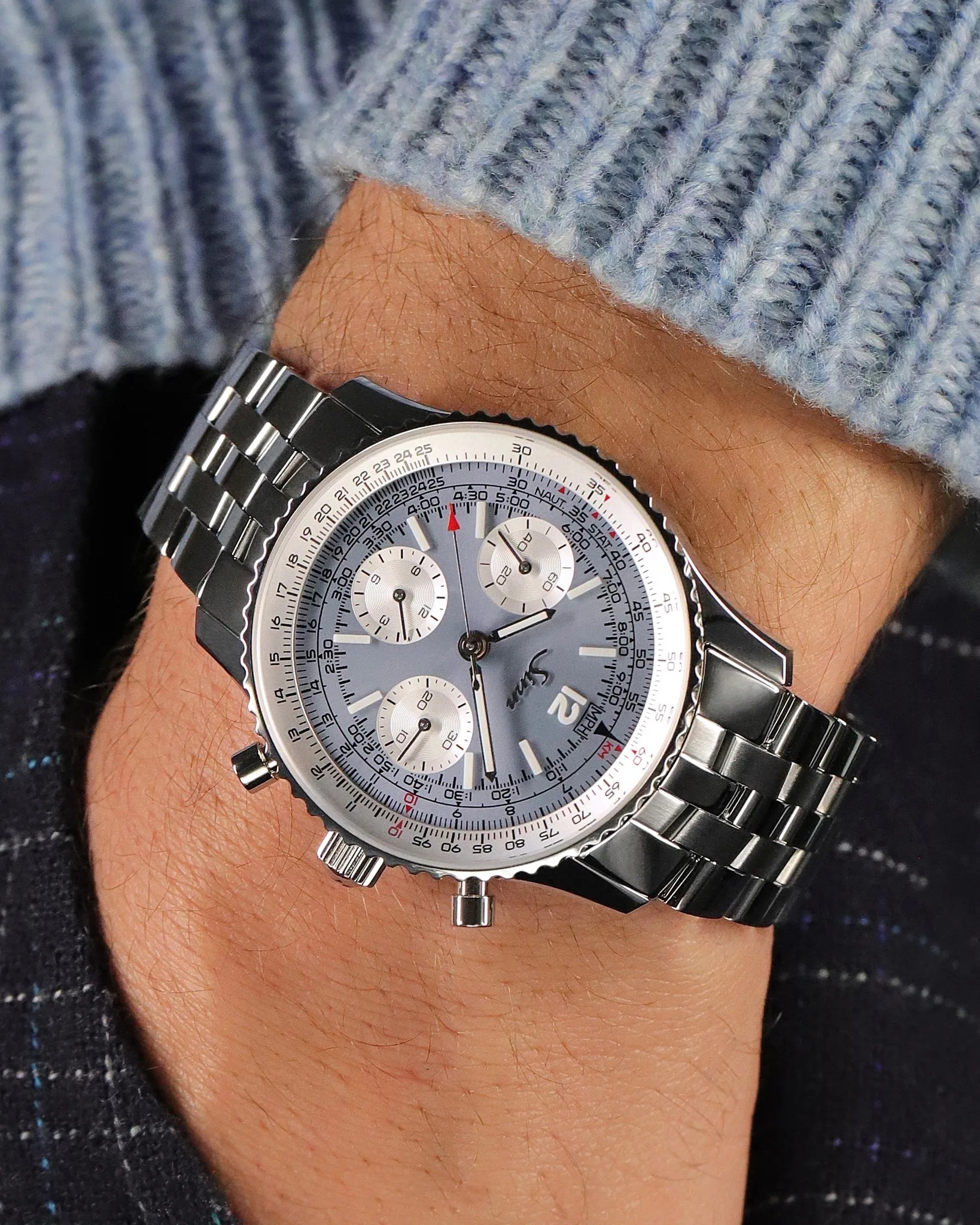 sinn chronograph watch on a mans wrist