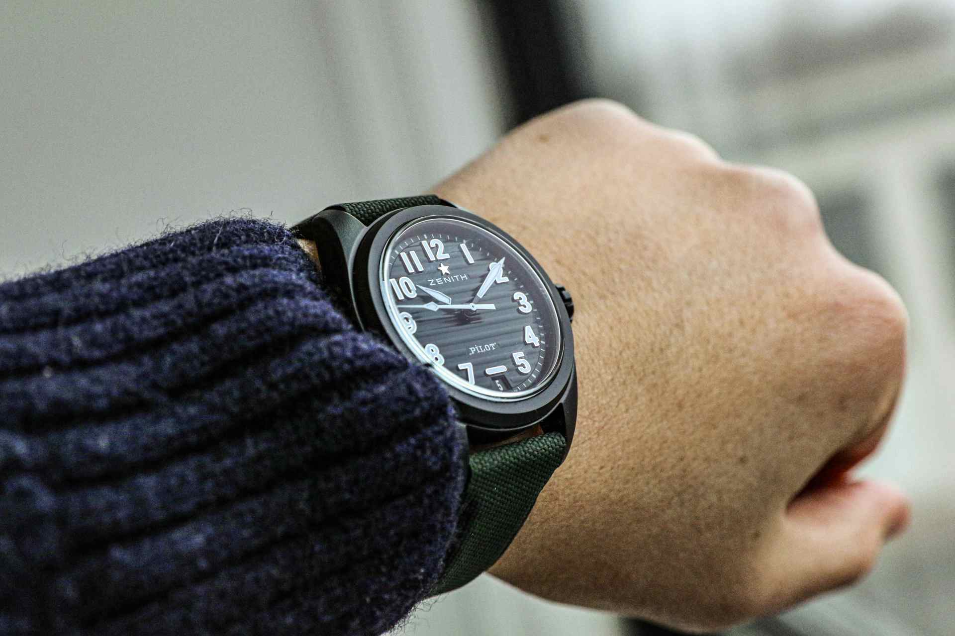 zenith watch on mans wrist