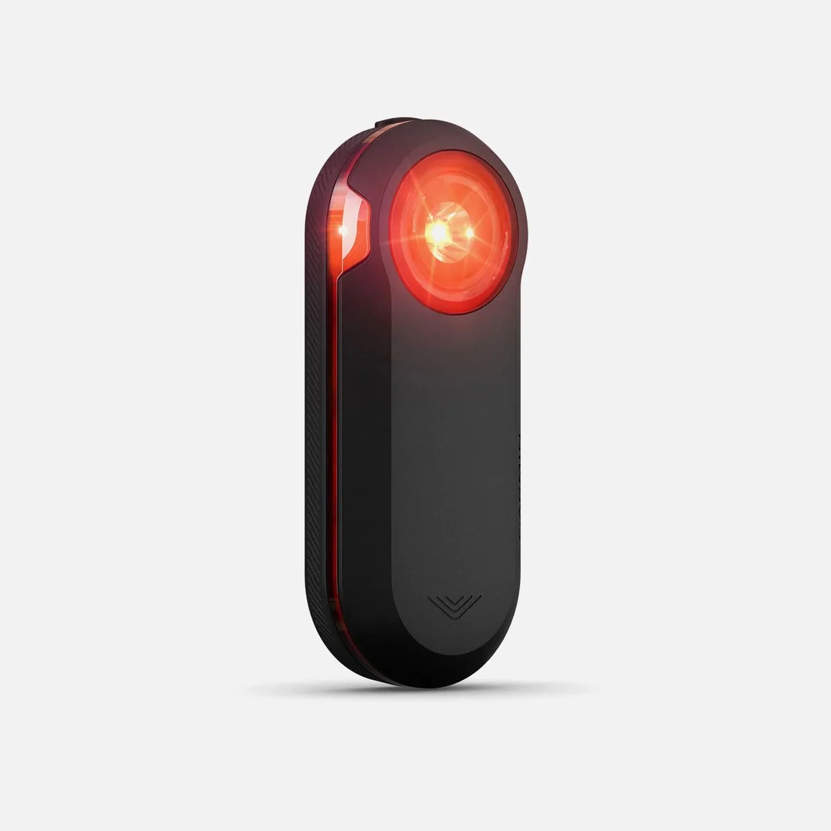 Garmin Varia RTL510 Cycling Rearview Radar with Tail Light Shown from side angle on grey background.