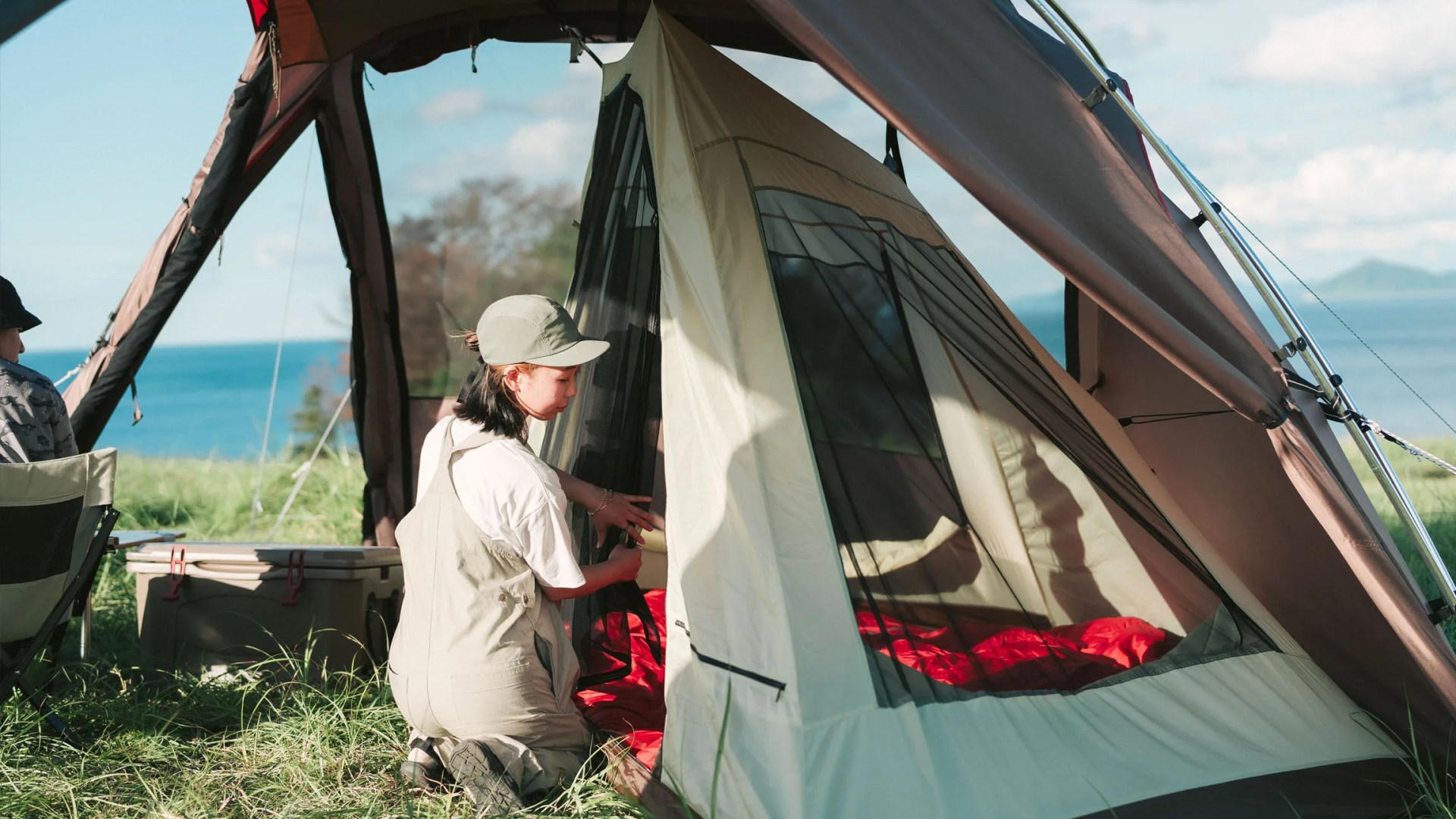 Snow Peak Fubi Tent being tended to by a woman