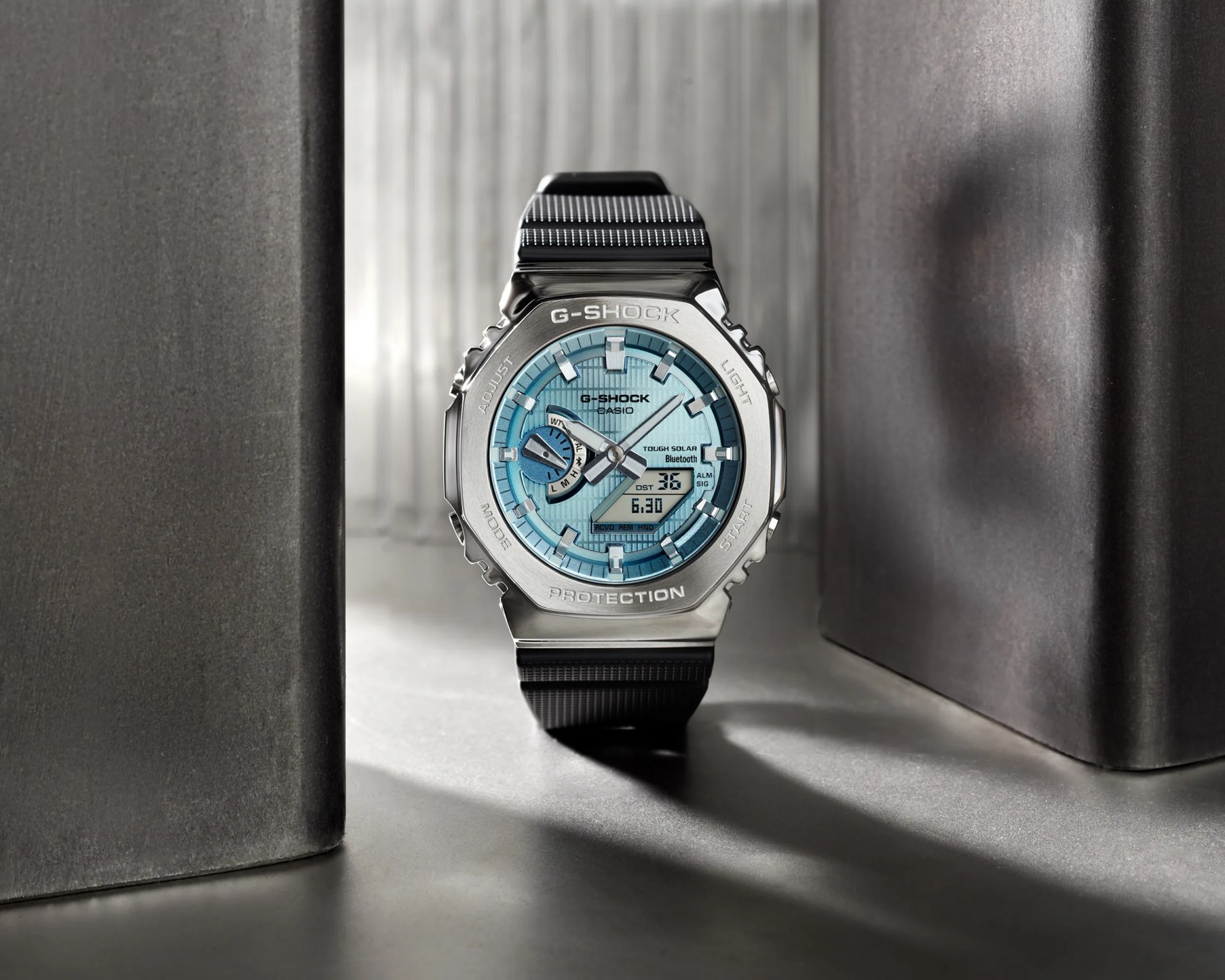 watch in metal landscape