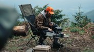 man sitting in a camp chair