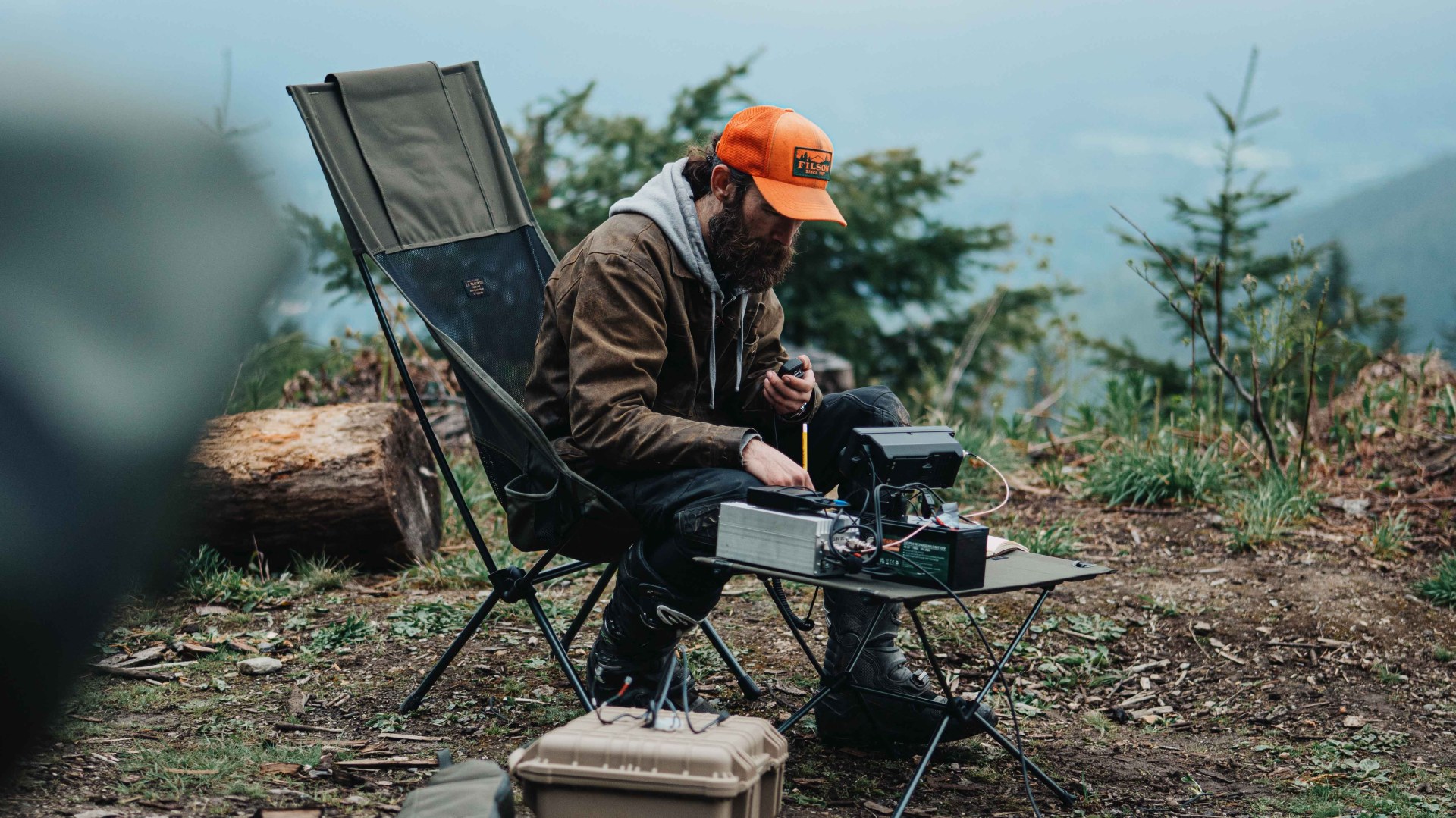 man sitting in a camp chair