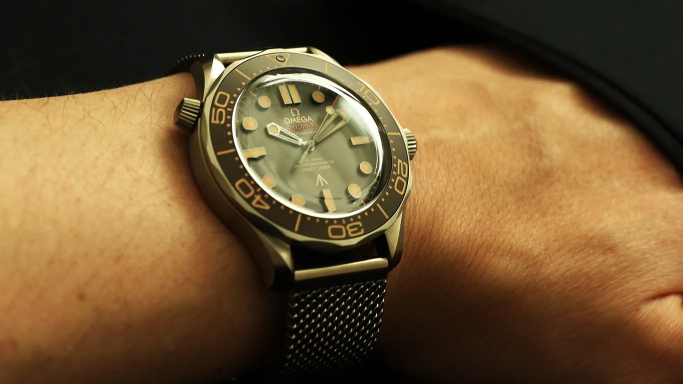 omega seamaster watch on mans wrist