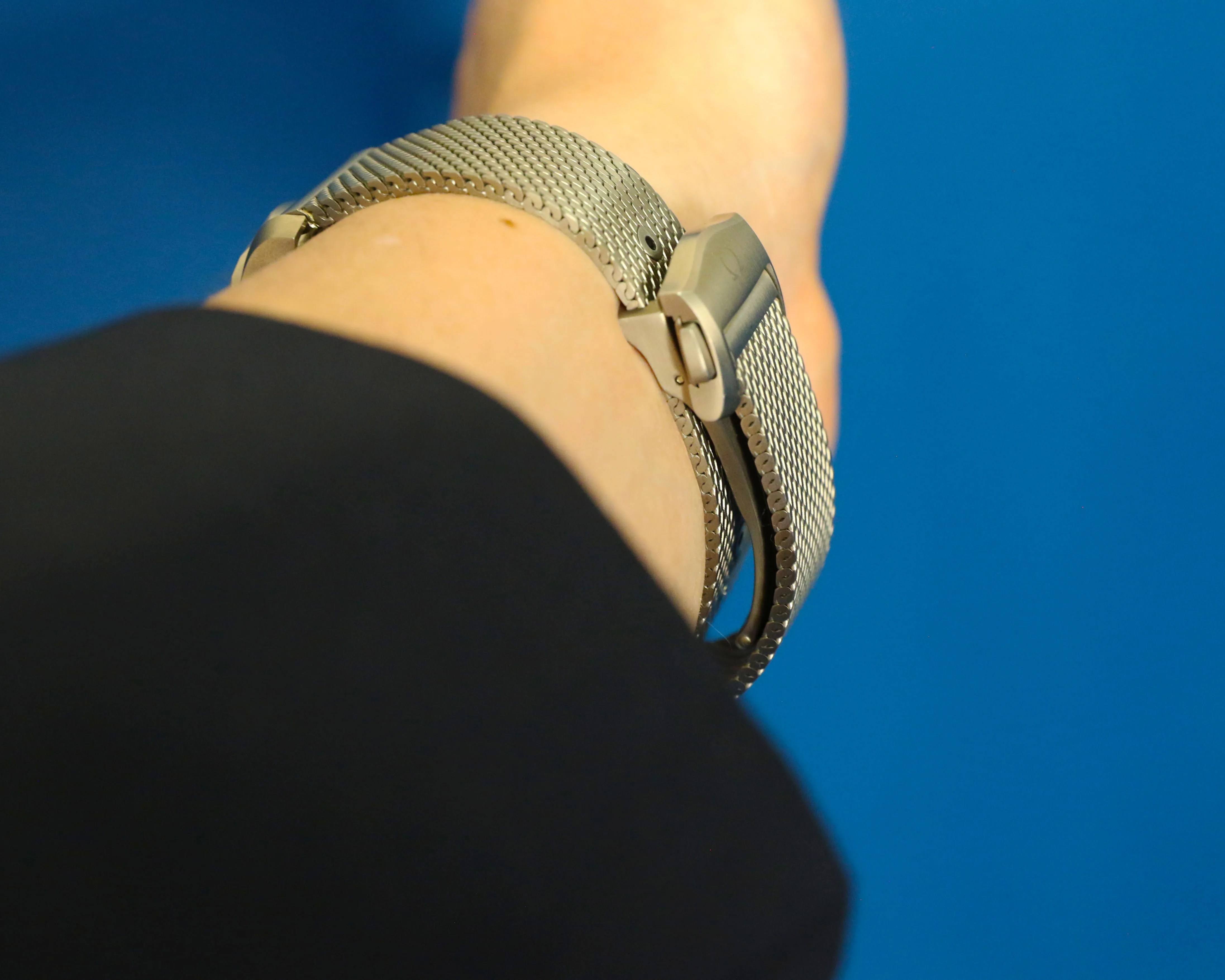 omega watch clasp on a wrist