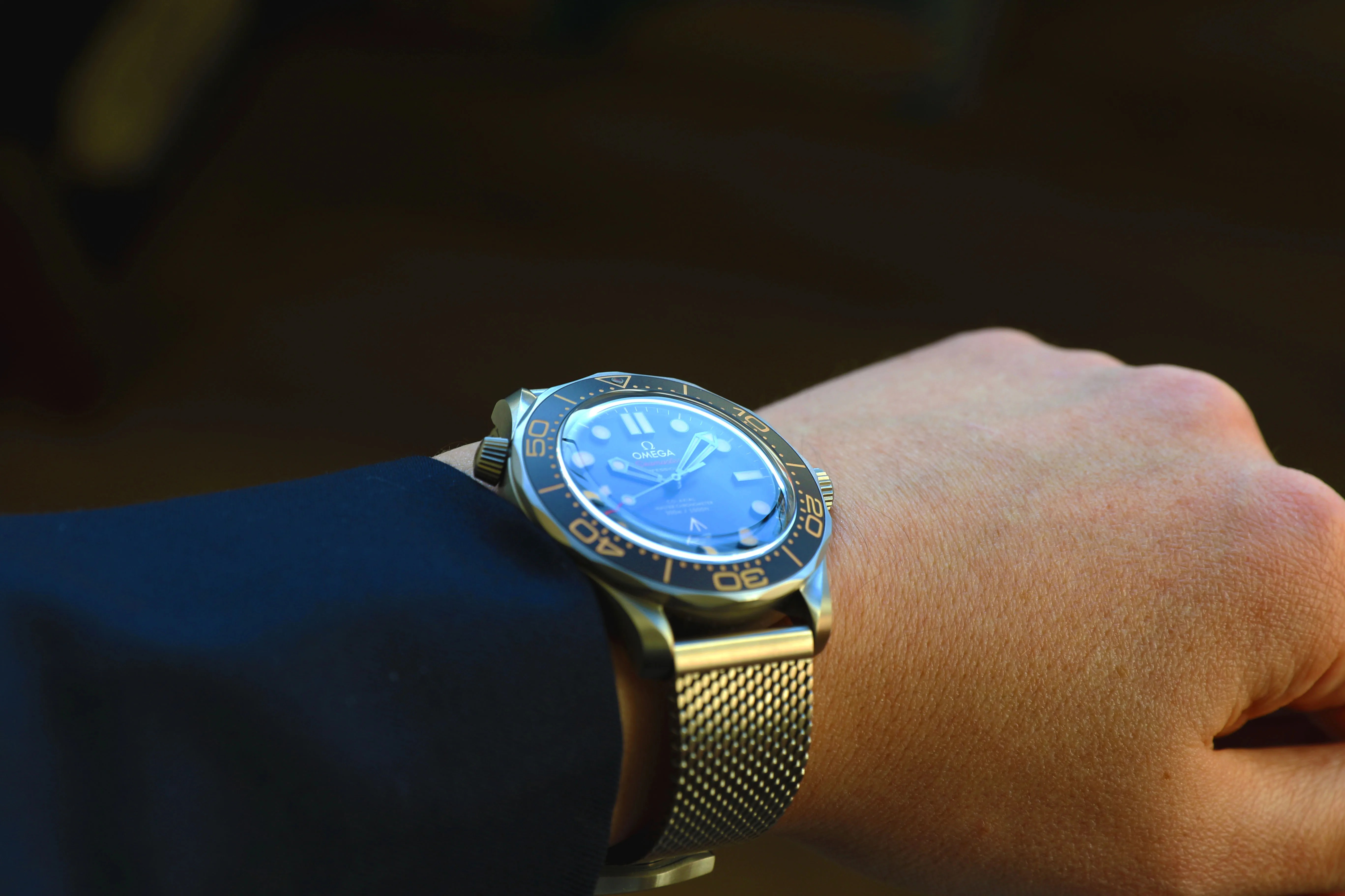 omega watch on a mans wrist