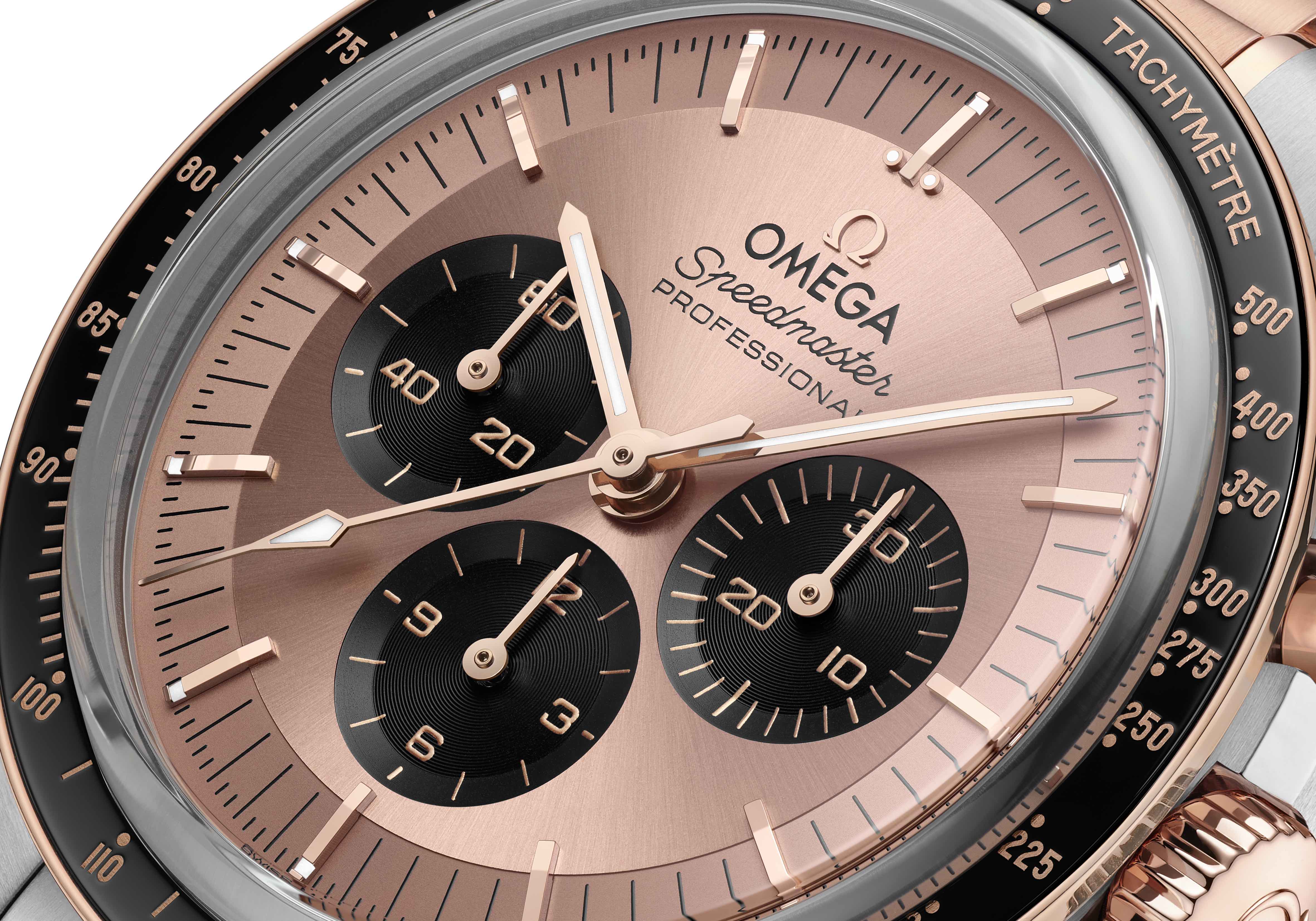 gold omega speedmaster dial closeup