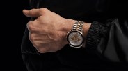 omega watch on a mans wrist