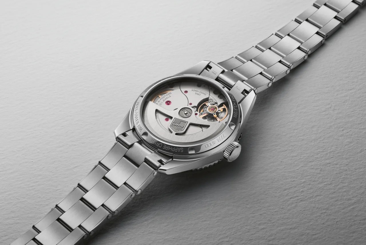 oris automatic watch movement seen through a display caseback