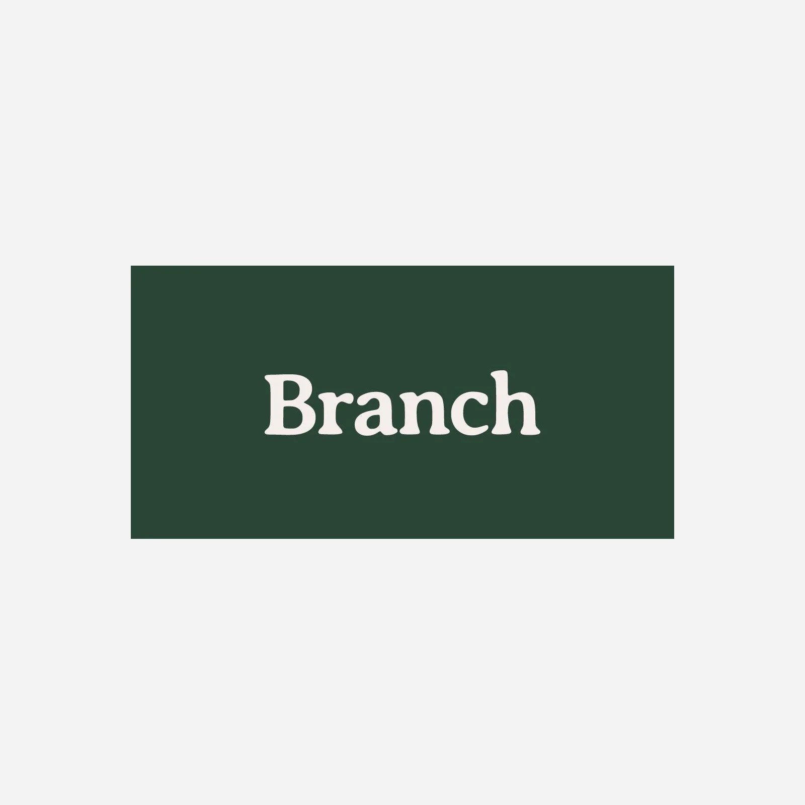 Branch furniture wordmark in cream white surrounded by a forest green rectangle. The entire logo. is backed by a light grey backround. 