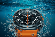 A rendering of the Samsung Galaxy Watch Ultra under water with bubbles surround the watch and its bright orange band