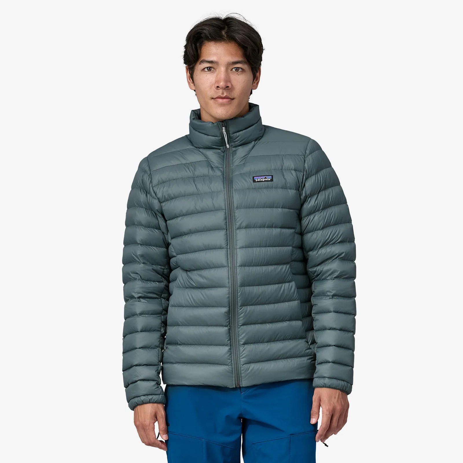 A man wearing a Patagonia Mens Down Sweater facing forward. The model is shown from the waist up.