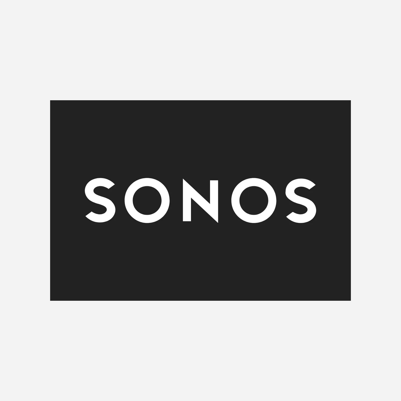 Sonos wordmark and logo in white surrounded in black rectangle. The logo is sitting against a light grey background.