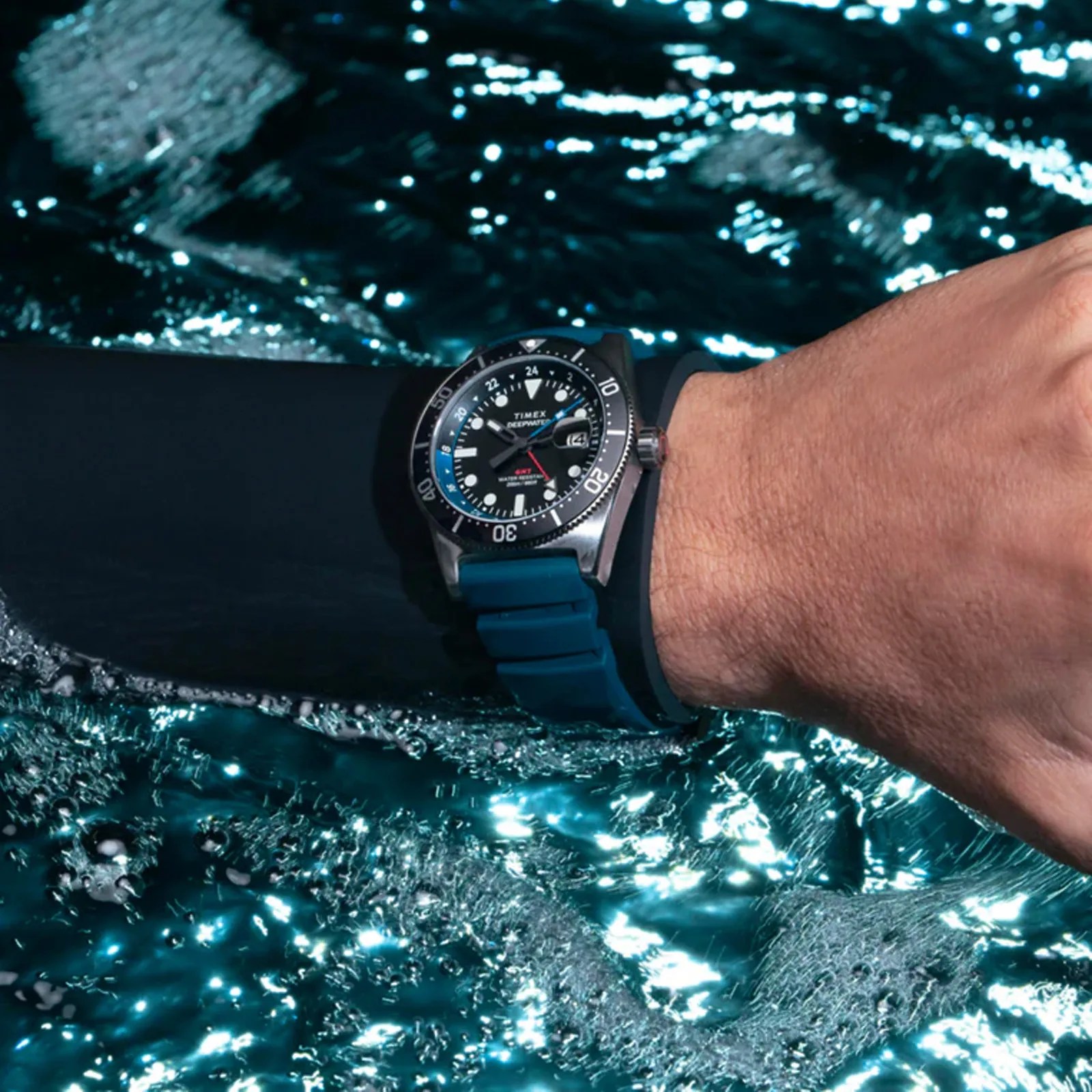 Timex Deepwater dive watch on a diver's wrist