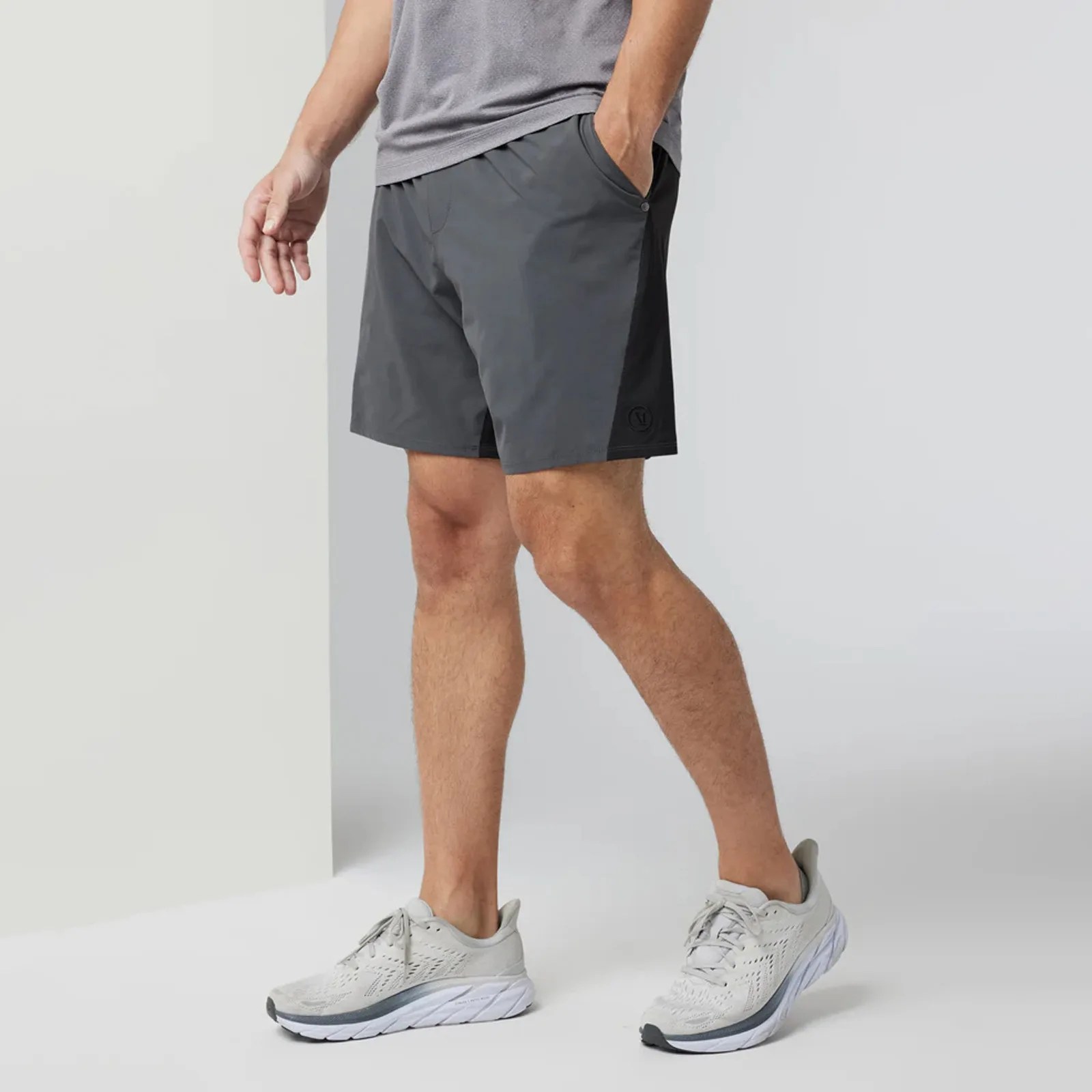 A man shown from the waist down wearing Vuori Chromatic Kore Short
