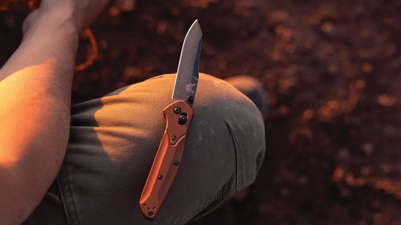 benchmade pocket knife on a mans knee