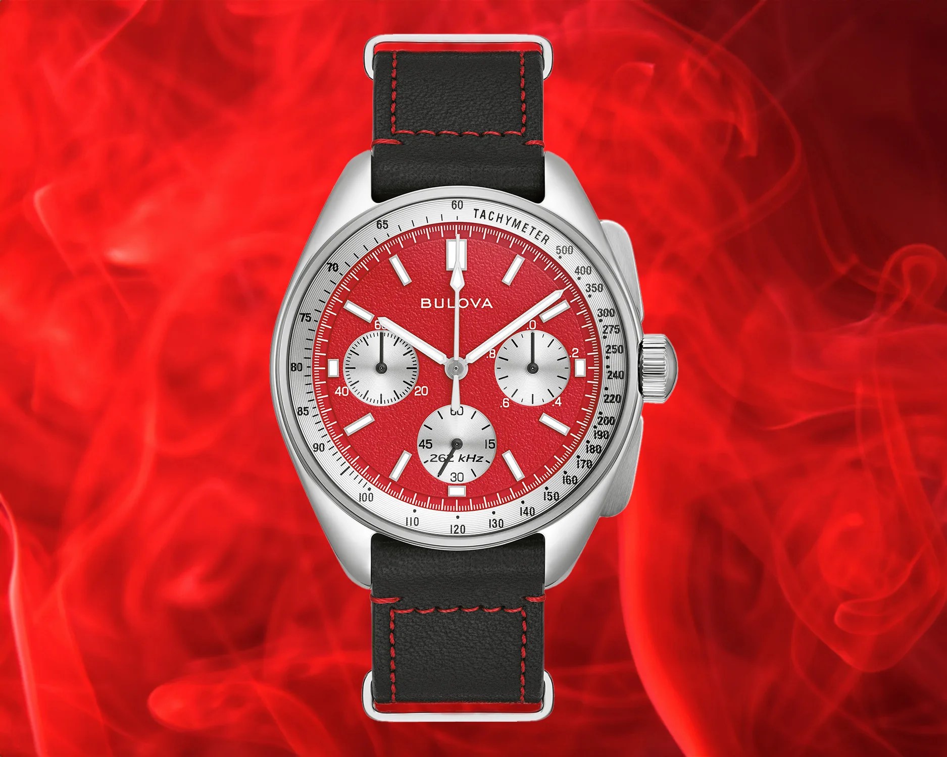 bulova red watch against a red smoky background