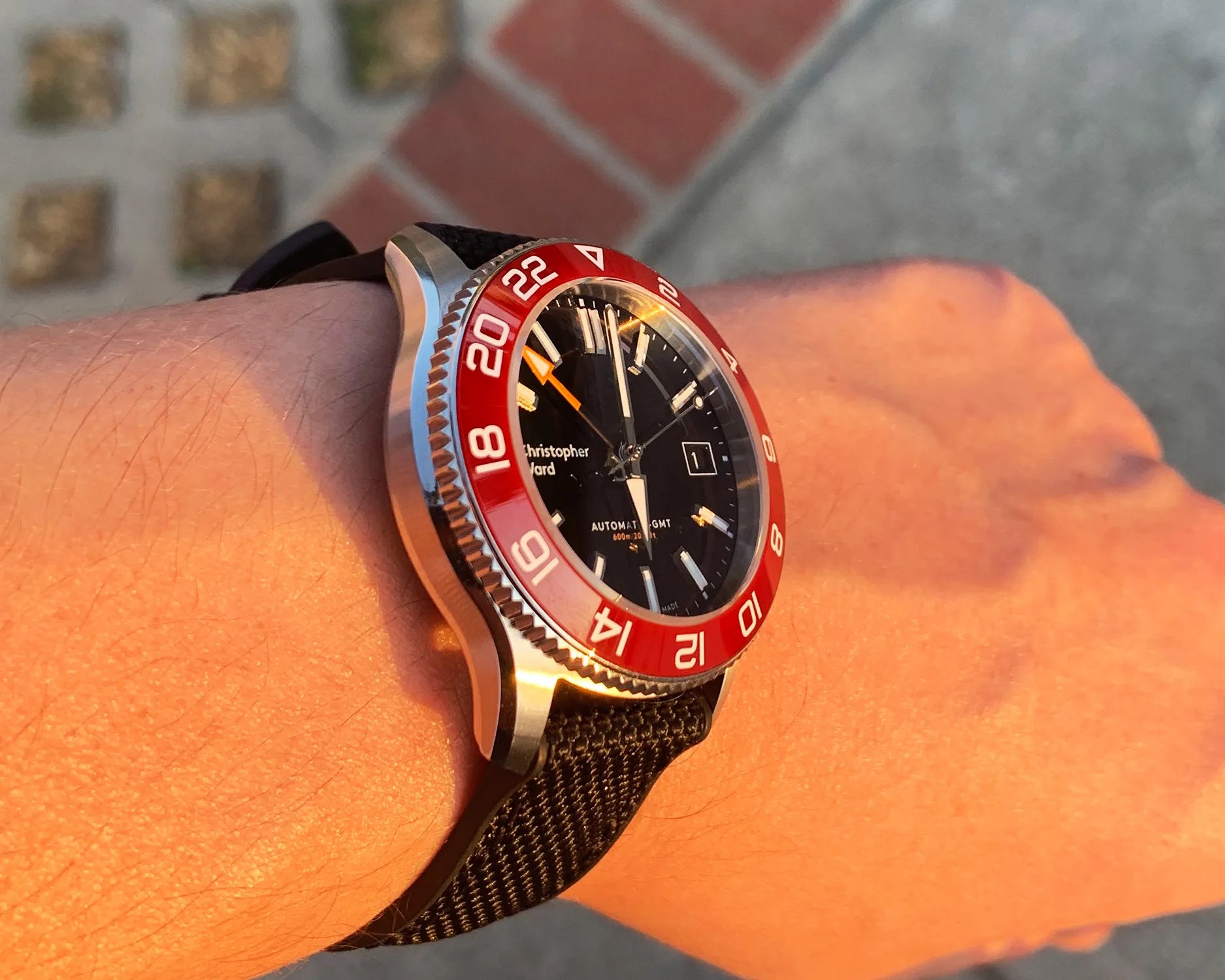 christopher ward watch on a mans wrist