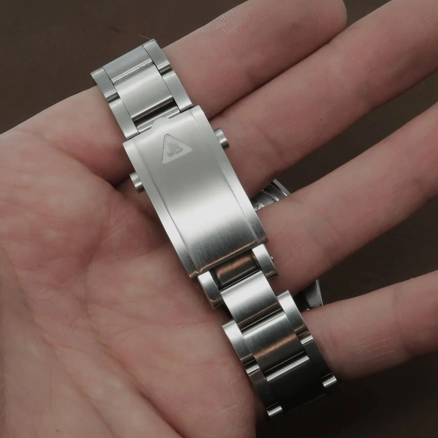 forstner watch bracelet in a persons hand