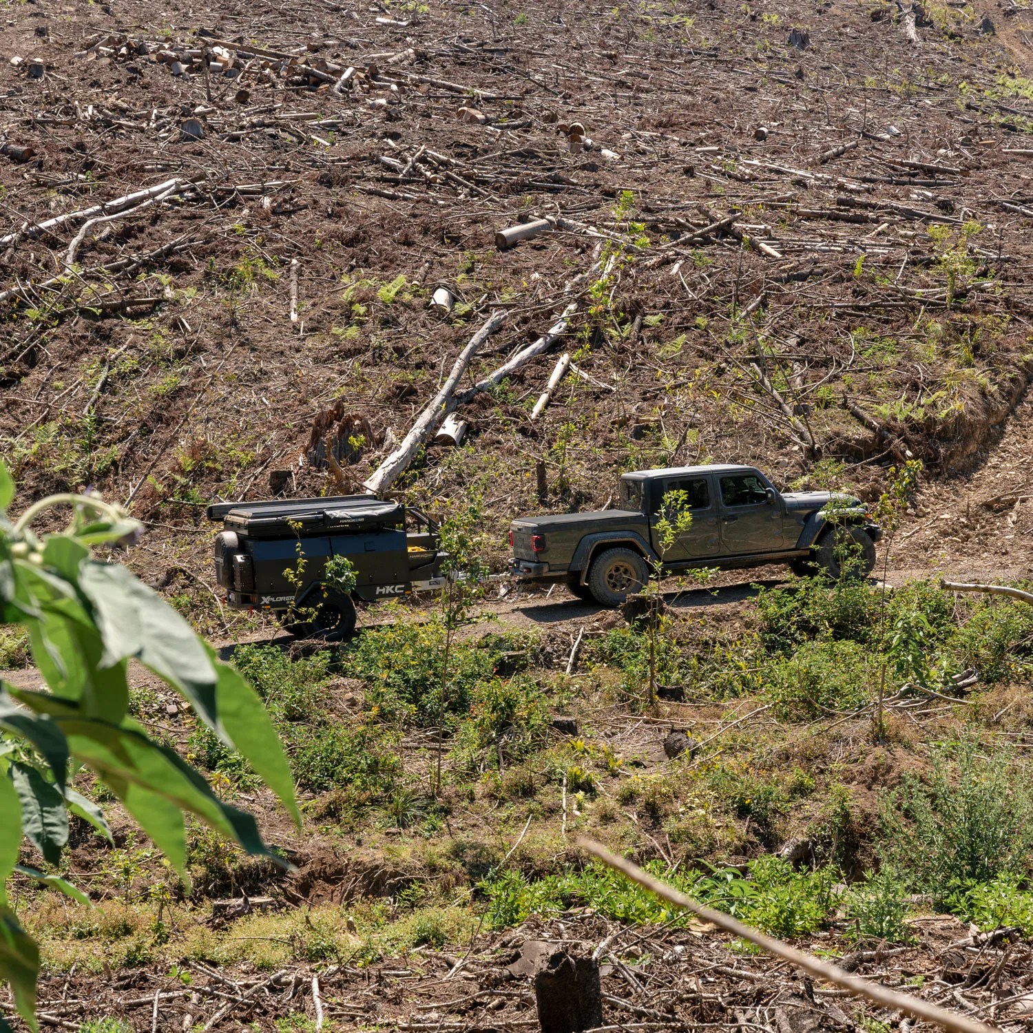 hardkore campers trailer towed behind a jeep truck