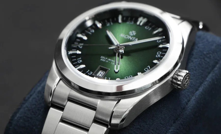 a closeup of a green monta watch