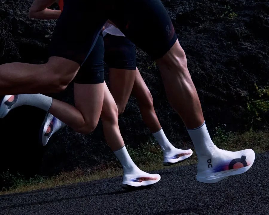 Runners wearing white running shoes