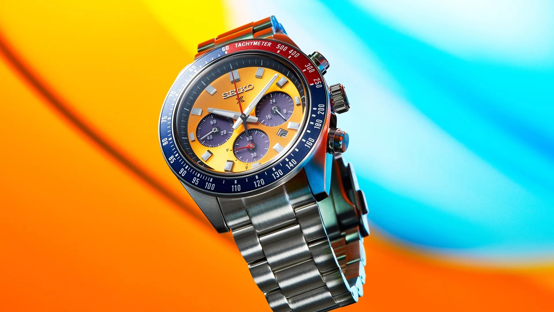seiko chronograph watch against a colorful background