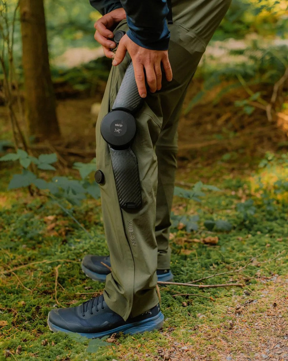 man wearing an exoskeleton in the outdoors