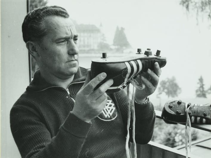 black and white photo of adi dassler