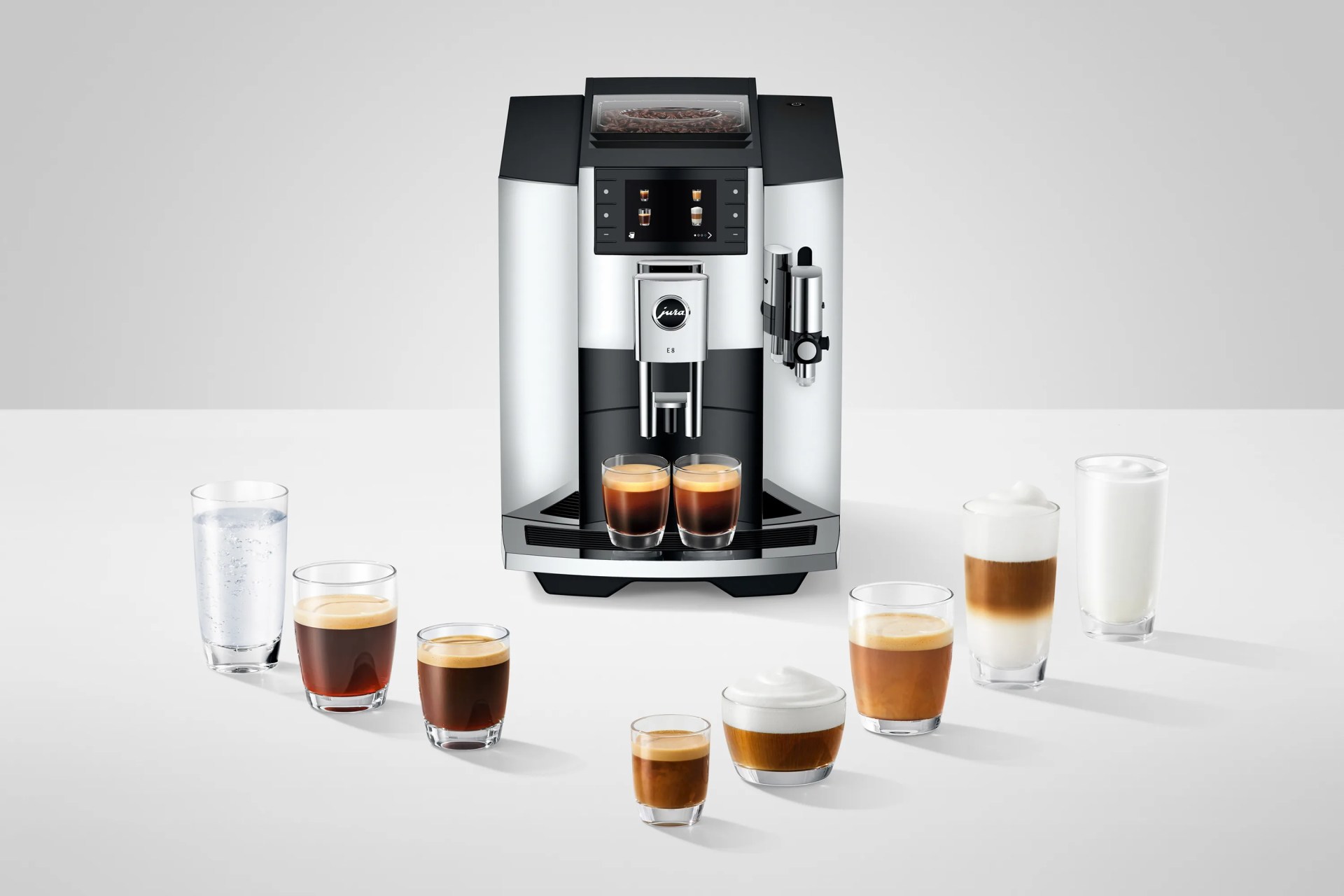 espresso maker surrounded by different espresso shots