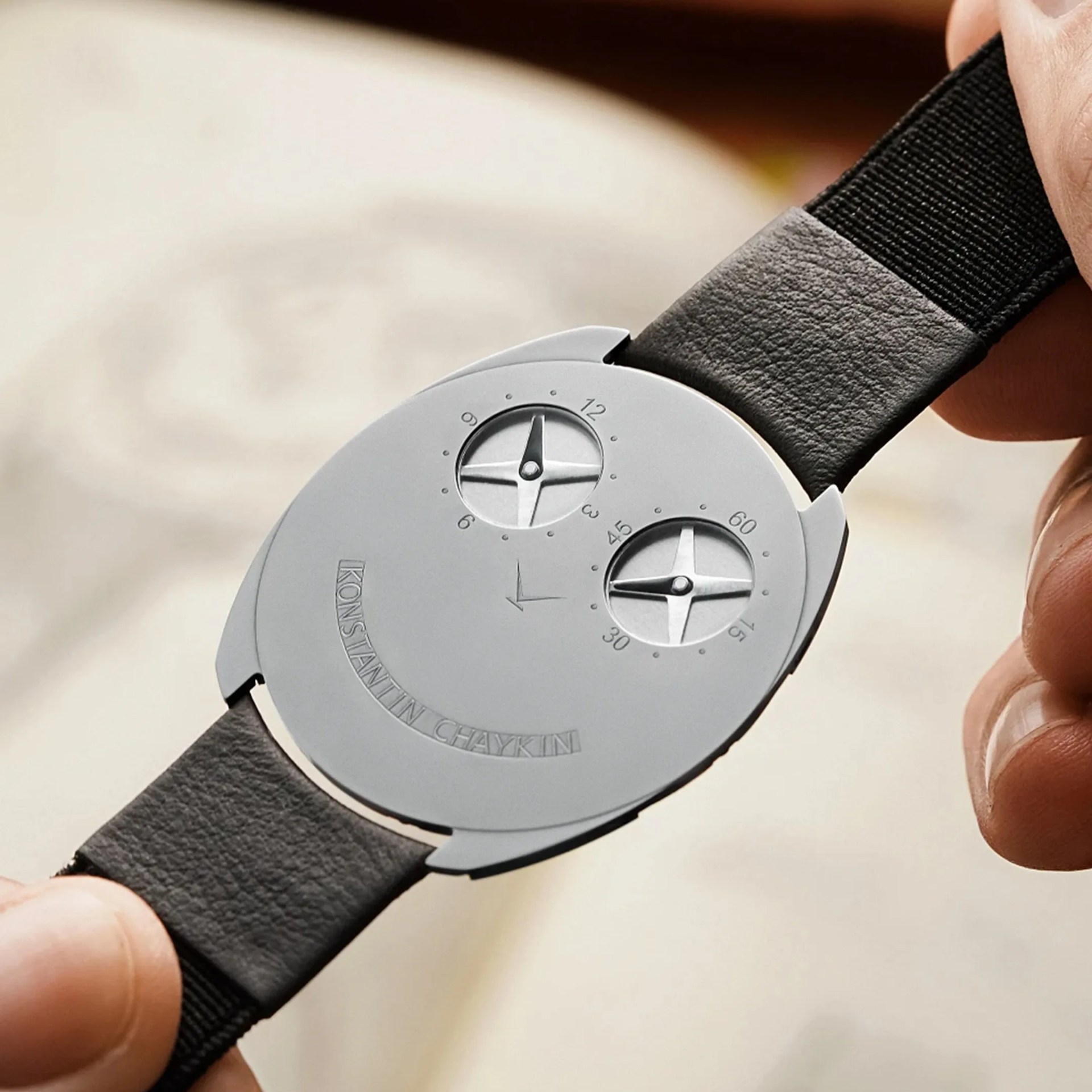 a person holds a konstantin chaykin watch