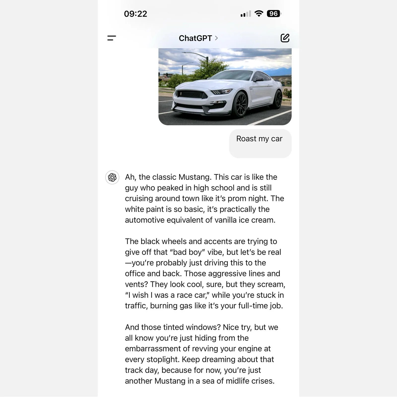A screen shot showing a text thread between an individual and ChatpGPT asking ChatGPT to roast the users white Ford Mustang