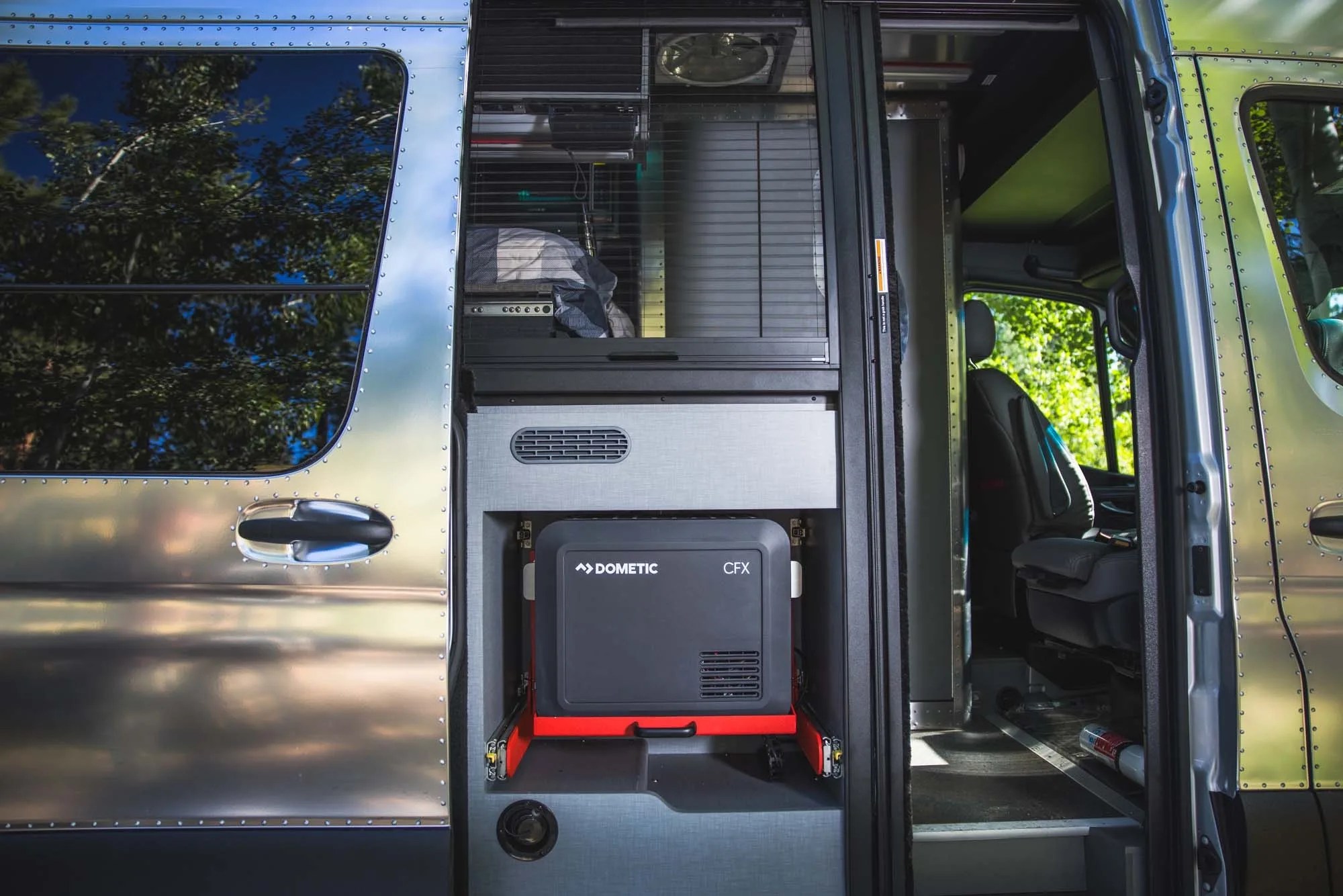 dometic portable fridge inside an airstream camper van