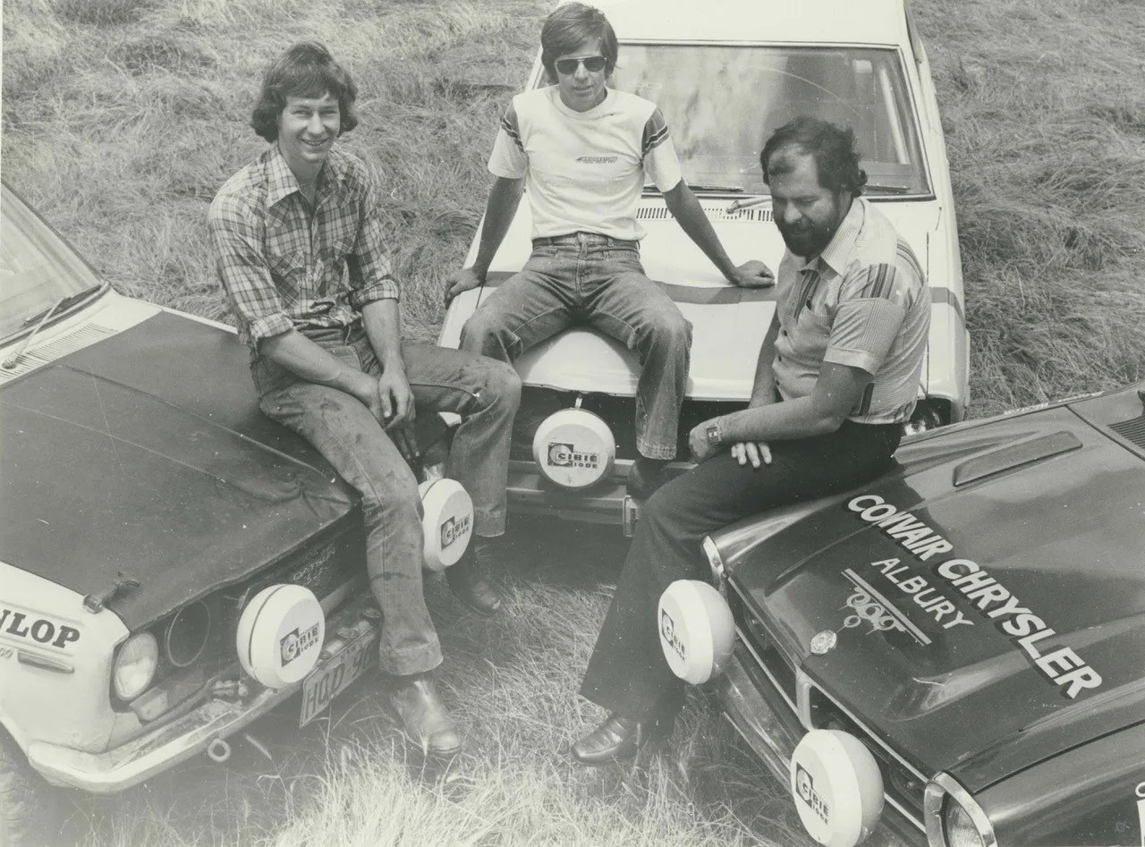 black and white photos of men sitting on the hoods of rally cars in the 1970s