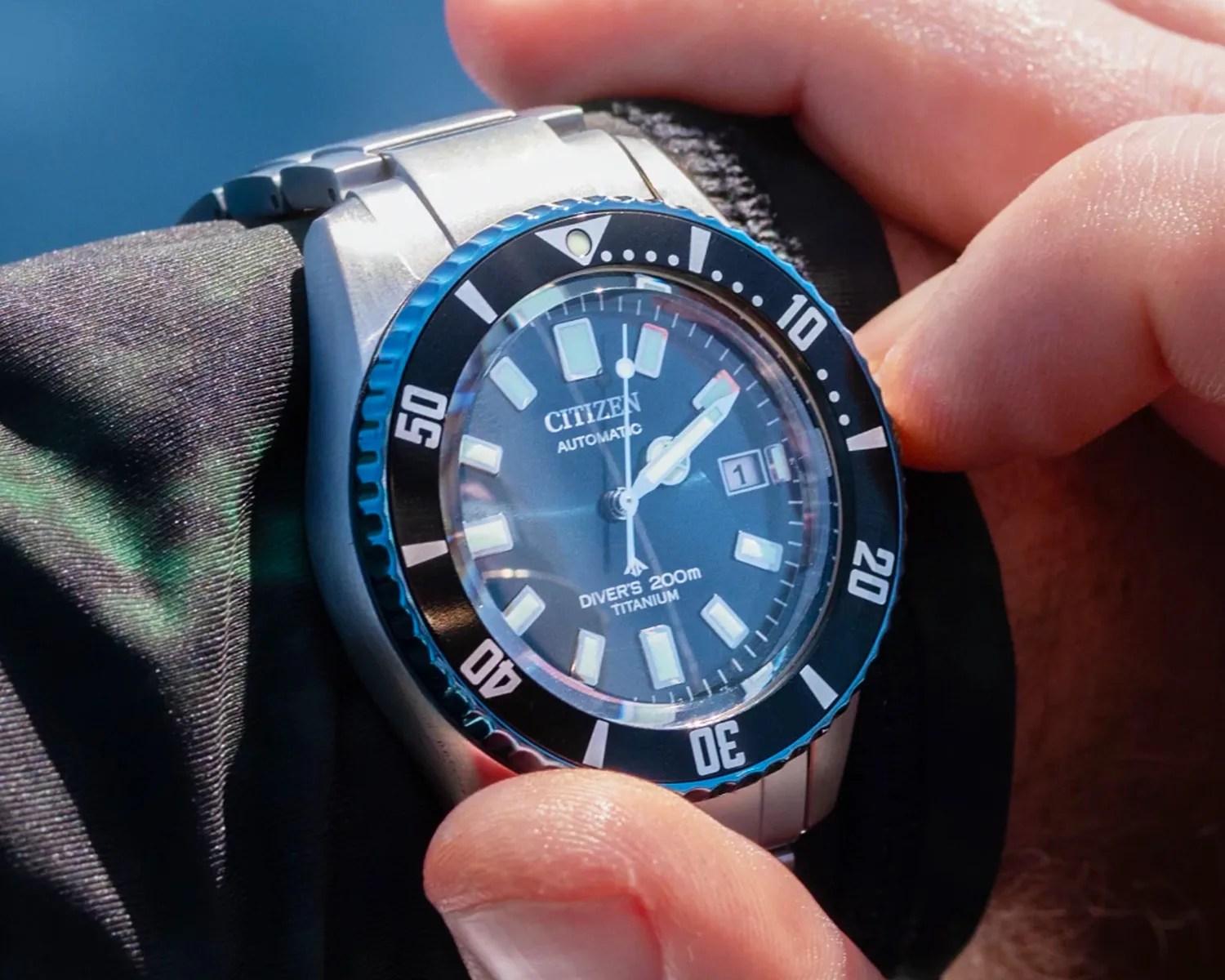 citizen dive watch on a mans wrist