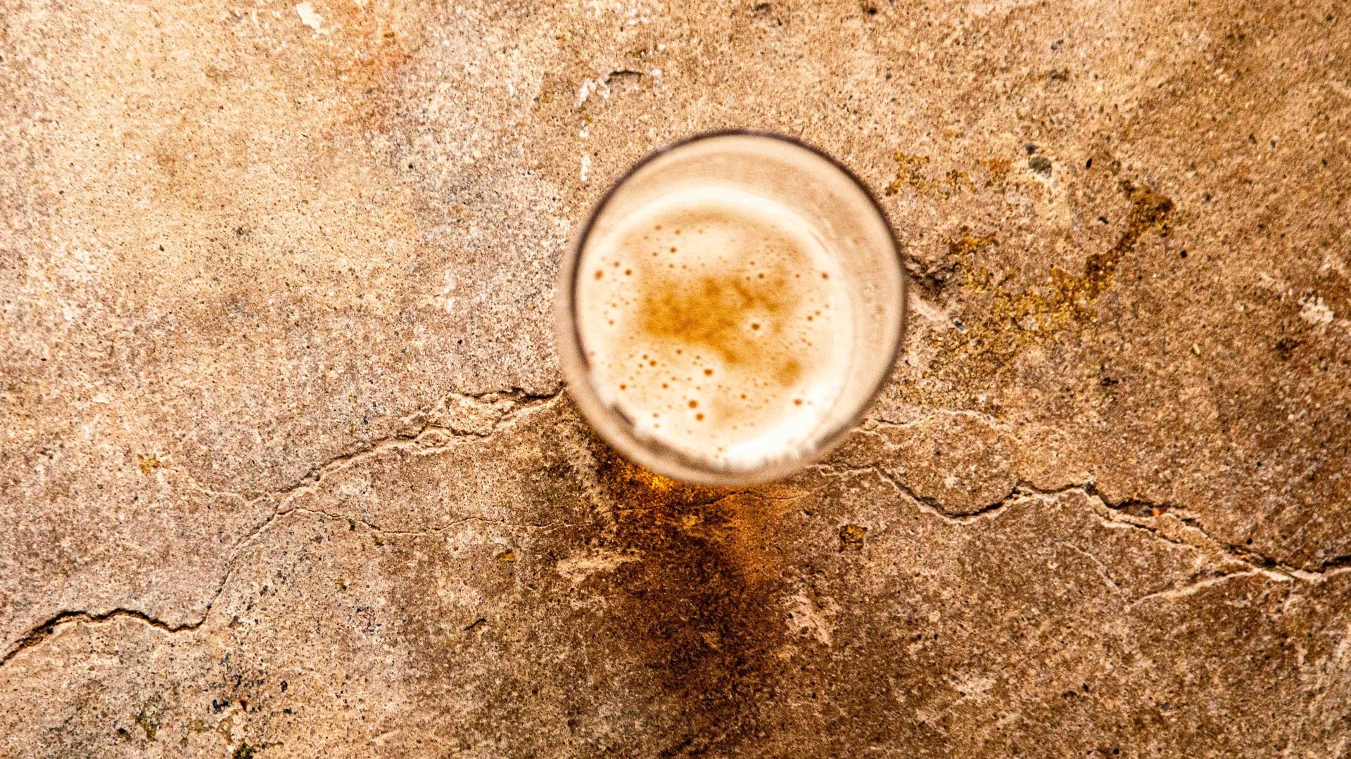 glass half full of beer