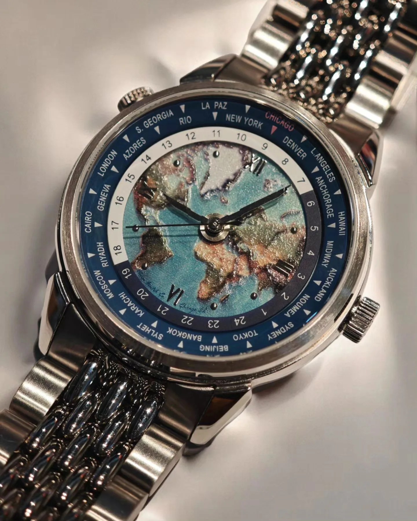 a haim world time watch dial